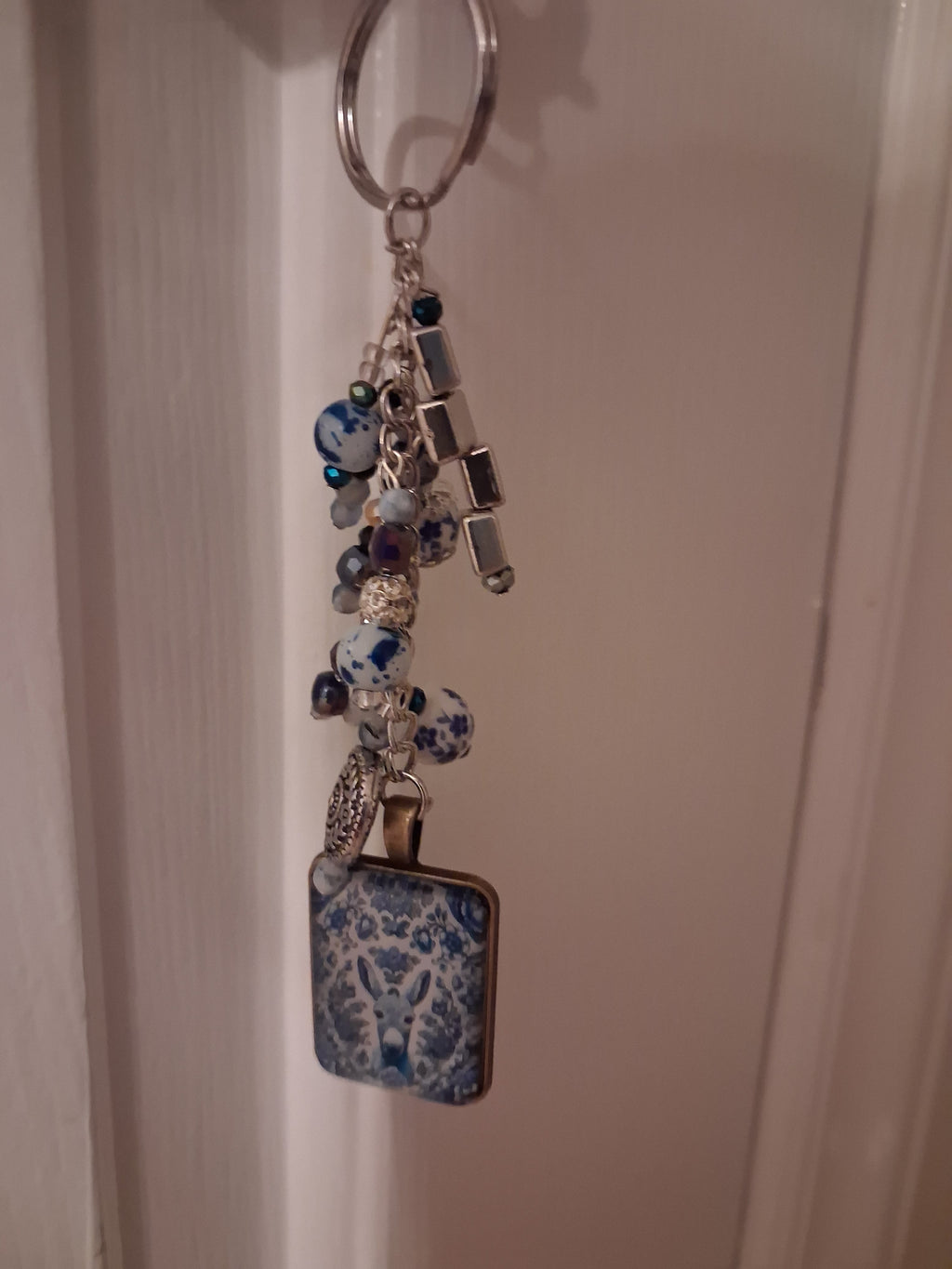 Delft donkey purse dangle hanging naturally